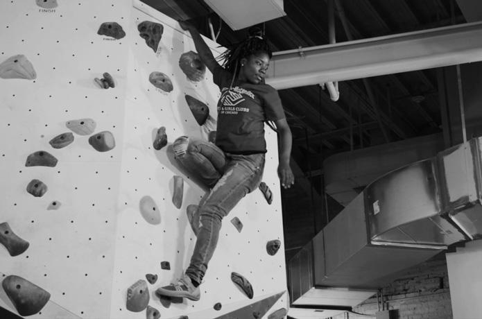 A Boys and Girls Club of Chicago member climbs at First Ascent in Chicago.