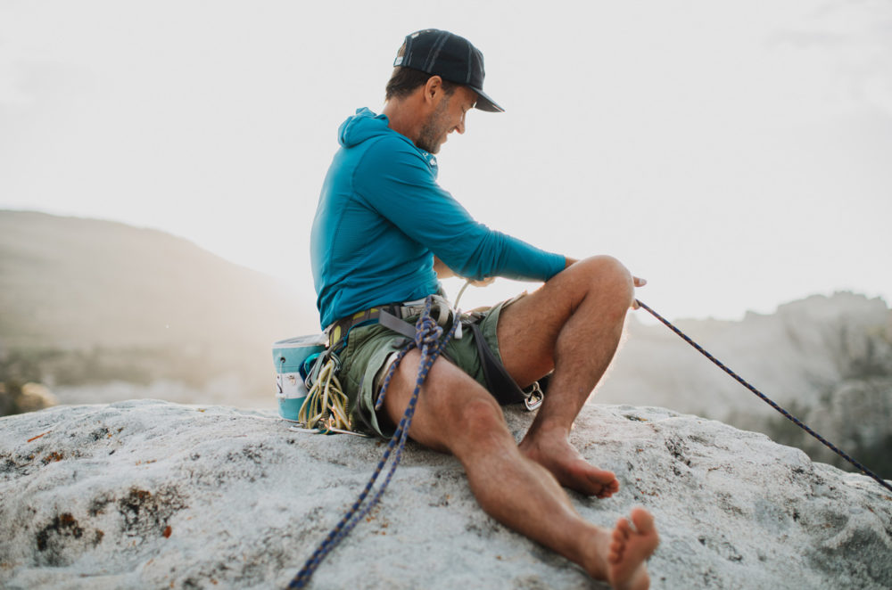 TOMS founder Blake Mycoskie prepares to rappel.