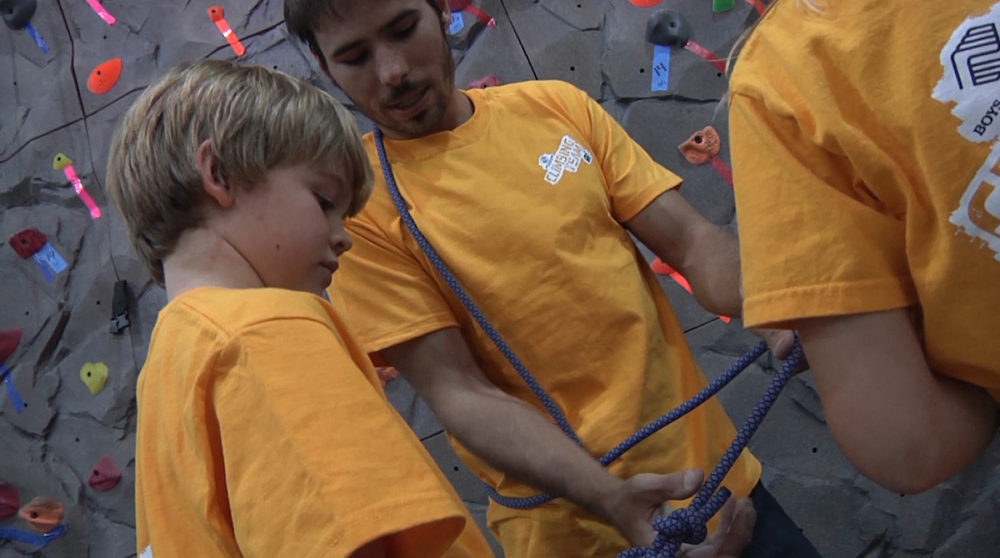 Kevin Jorgeson instructs about climbing to first timers.