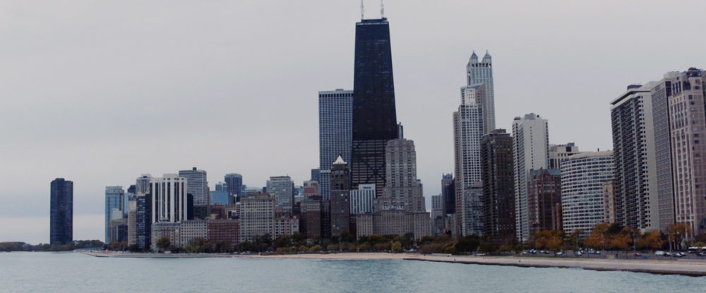 Image of the John Hancock building and Chicago skyline.