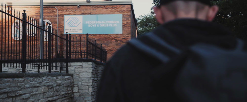 1Climb and So iLL co-founder, Dan Chanceller walks outside of the Boys and Girls Club of Chicago.