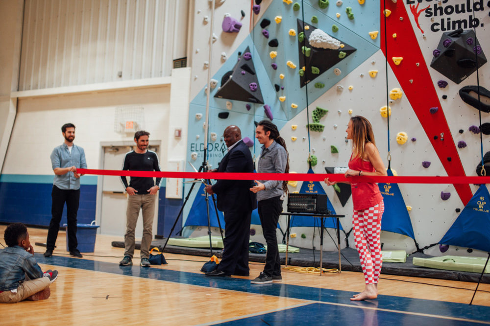 Ribbon cutting for the new STL boys and girls club wall.