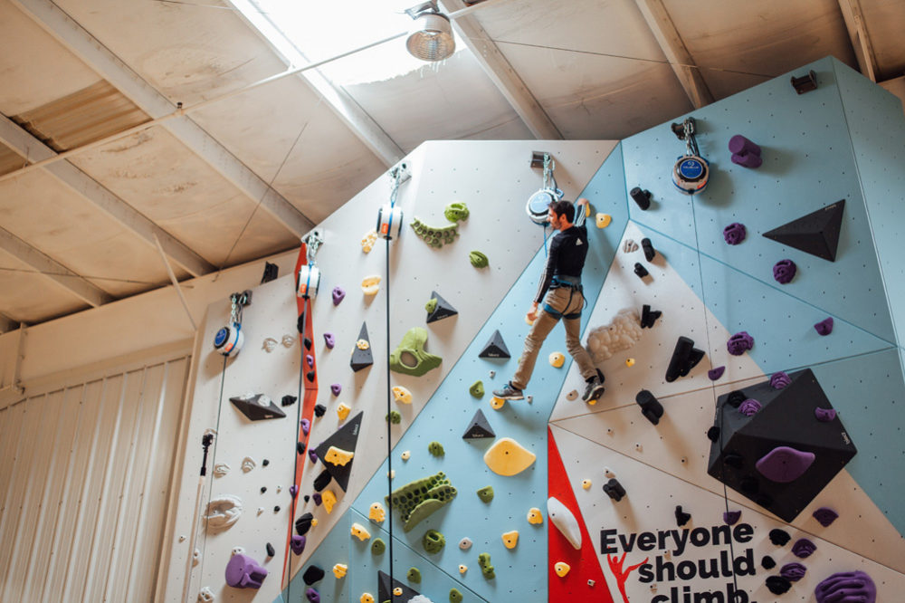 Kevin Jorgeson climbs on the newly constructed Saint Louis Boys and Girls Club wall.