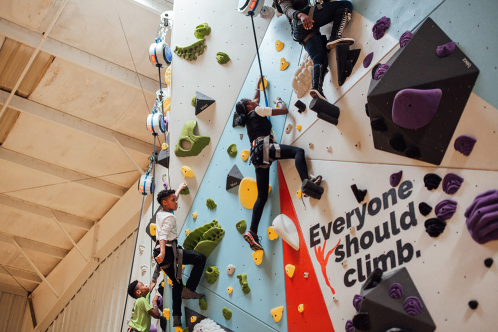 Saint Louis Boys and Girls club members try climbing for the first time.