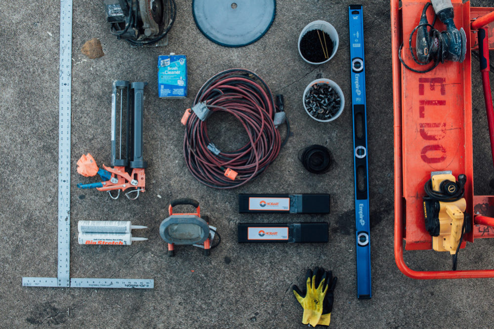 An overhead image of ElDorado climbing wall tools laid out.