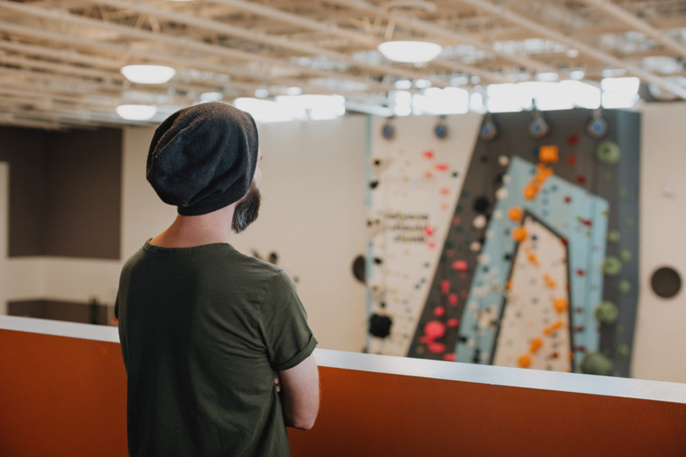 Dan Chancellor, co-founder of 1Climb and founder of So iLL scopes out the new LA Variety Boys and Girls Club climbing wall.