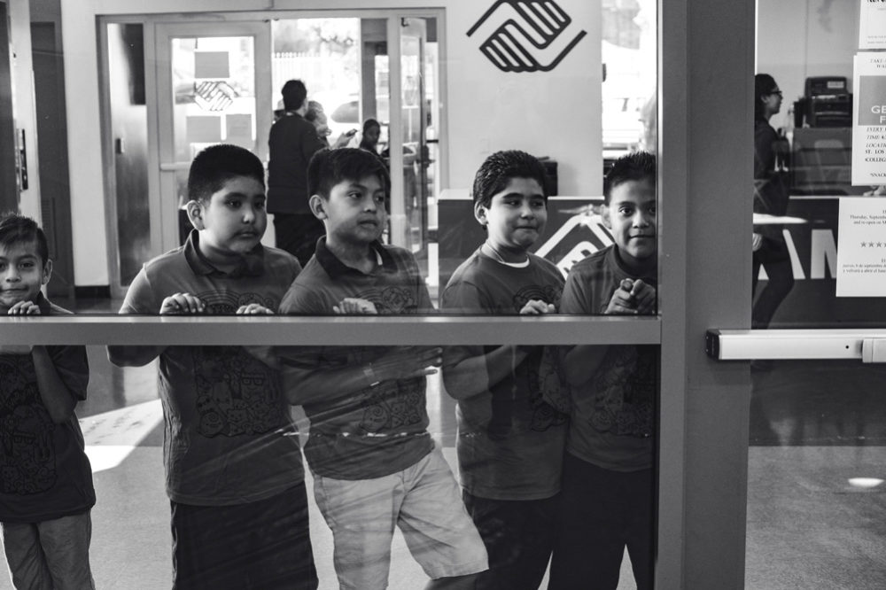 LA Variety Boys and Girls Club members wait to get on the new climbing wall.