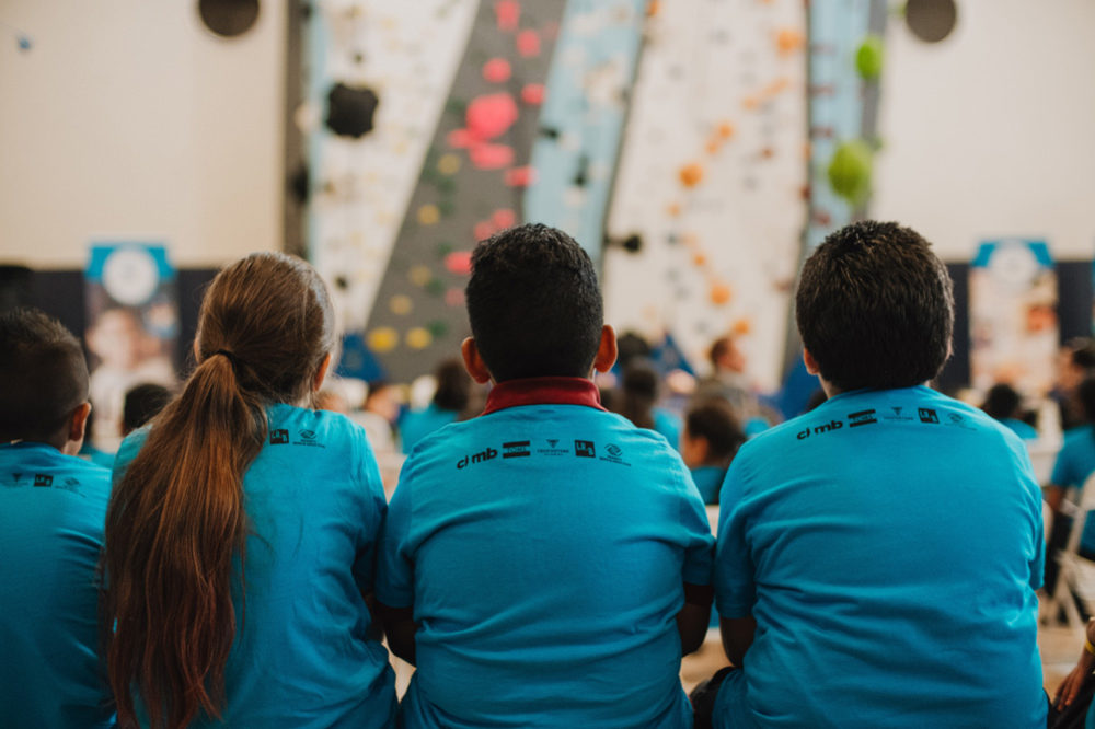 LA Variety Boys and Girls Club members check out the climbing wall for the first time.