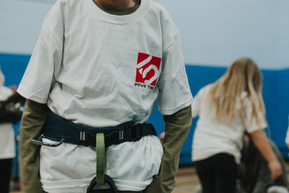 a boys and girls club member is shown in a 5.10 tee shirt