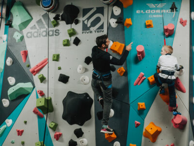 1 climb co founder kevin jorgeson helps a boys and girls club member climb up the new 1climb wall in santa rosa