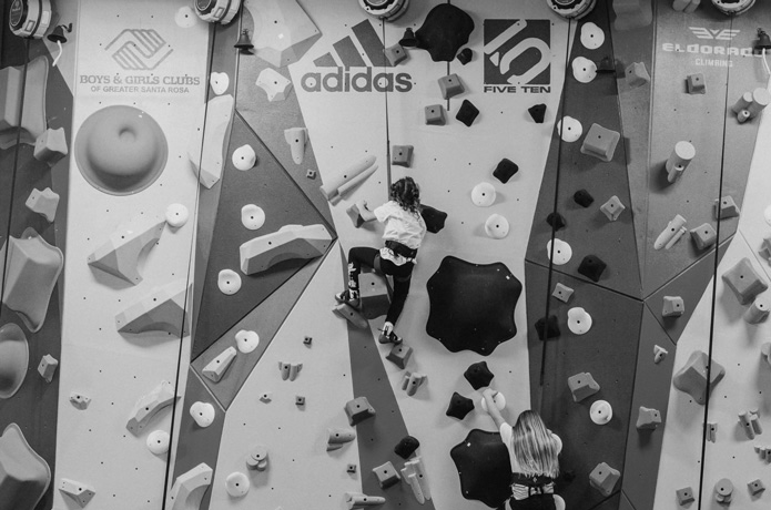 members of the santa rosa boys and girls club climb on the newly installed 1climb wall